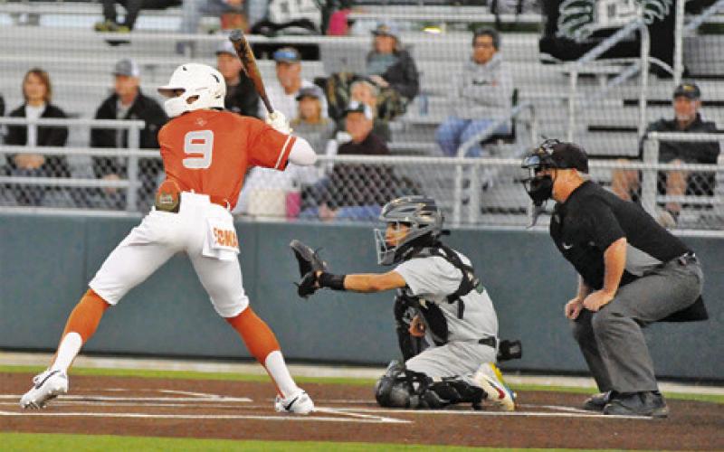 CALDWELL’S COY BECKA bats against Taylor. The Hornets won 4-3 in 10 innings. -- Tribune photo by Denise Squier