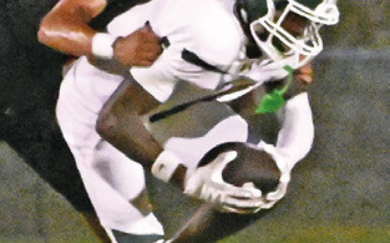 A SOMERVILLE player makes a tackle last Friday against Normangee. The Yeguas lost their season opener 35-16 at home. Tribune photo by Denise Squier