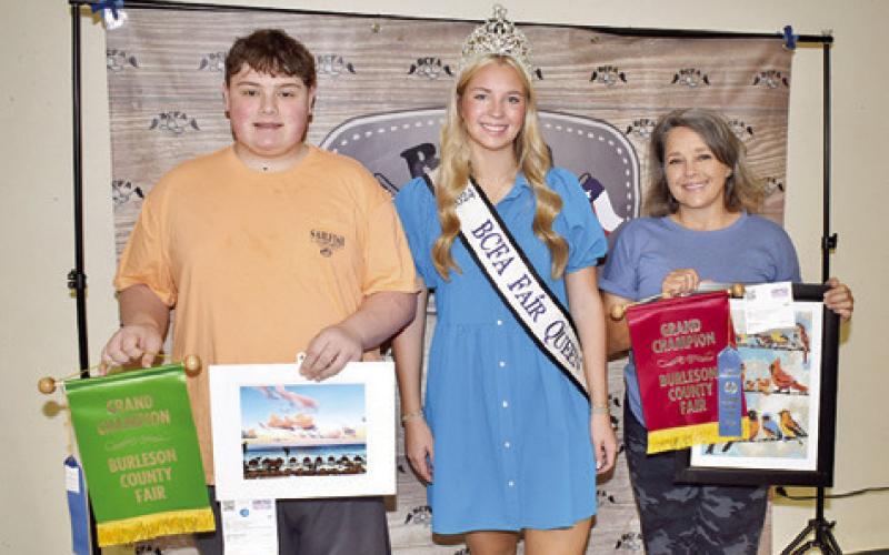 LOGAN GIESENSCHLAG won grand champion for landscape-nature, and Windy Turner won for creative arts. Also pictured is Burleson County Fair Queen Hadleigh Novosad.