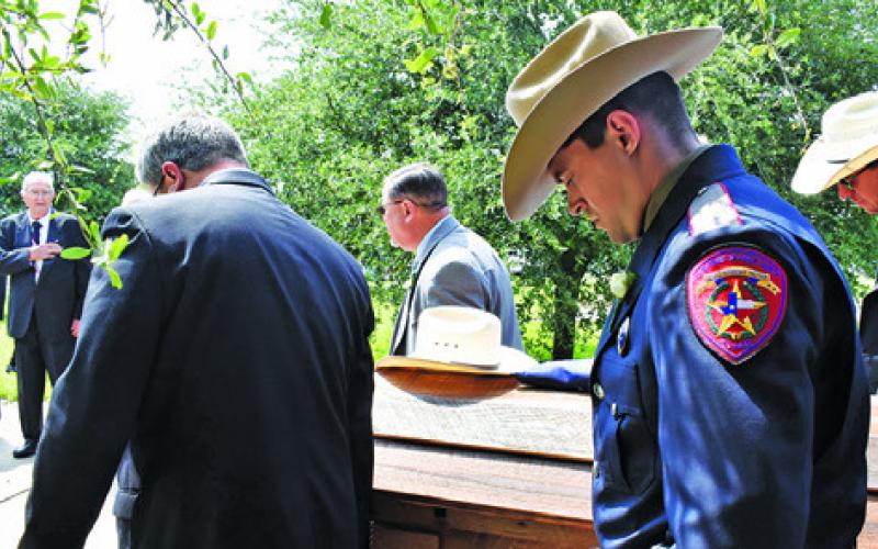 LARRY SEE, A longtime sheriff’s deputy, is carried to his final rest on Tuesday, April 30, at the Caldwell Masonic Cemetery. See served in the area for decades, starting when he was one of only a few Burleson County deputies patrolling the entire county. See was remembered as a faithful friend and law officer. -- Tribune photo by Roy Sanders