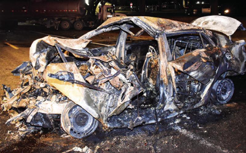 THIS CAR WAS destroyed in the Monday accident on SH 36 South. Tribune photo by Roy Sanders