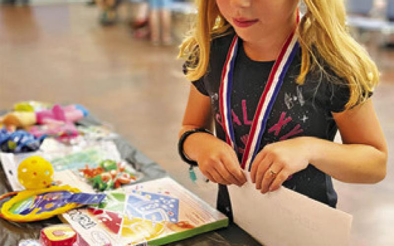 THE HARRIE P. Woodson Memorial Library held its summer reading program ceremony on Sunday at the Caldwell Civic Center with Caldwell Mayor Janice Easter presenting readers with their certificates.