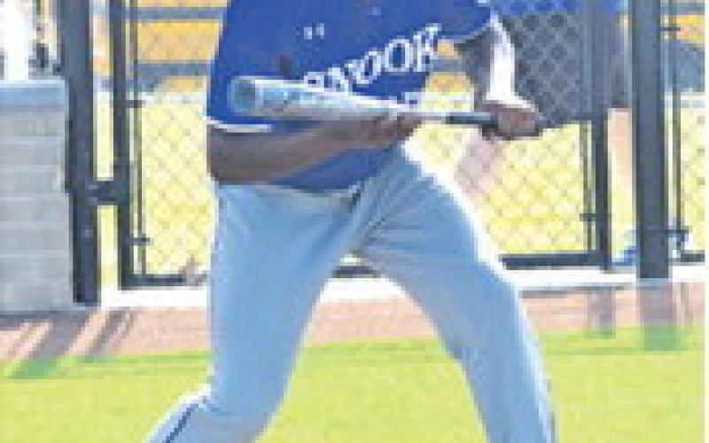 MARK MOORE OF Snook prepares to bunt against Big Sandy in the bidistrict playoff game on Friday in Navasota.