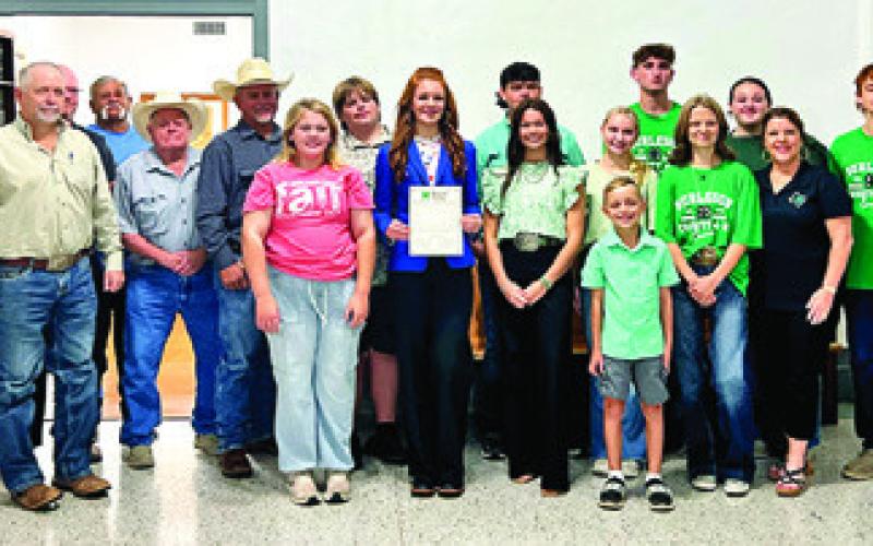 LOCAL 4-H PARTICIPANTS VISITED the Commissioners Court meeting on Monday, Sept. 22, to read a resolution declaring Oct. 5-11 National 4-H Week. Tribune photo by Sabine Lazo
