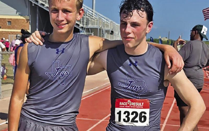 SNOOK’S BARRETT DUDENSING, left, qualified for the UIL Cross Country State Championships by placing 16th at the UIL Region IV Cross Country Championships on Oct. 21. Also pictured is Ethan Janac, right, who placed 37th at the regional meet.