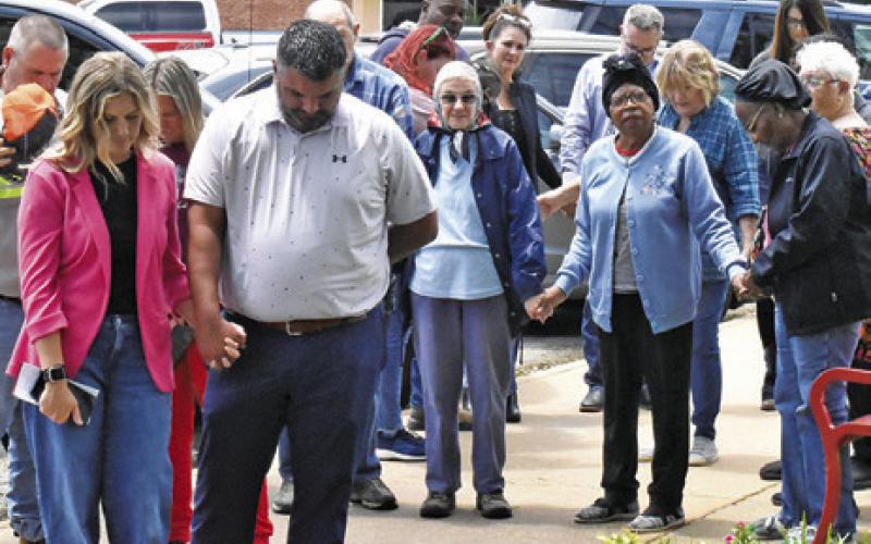 RESIDENTS FROM ACROSS THE COUNTY gathered in front of the Burleson County Courthouse last Thursday at noon with local pastors to pray together for the nation, state, county and all three cities within the county.