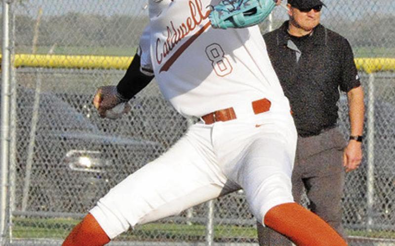 SHANE CLEMENTS of Caldwell pitches against Banquete. The Hornets won 10-0.