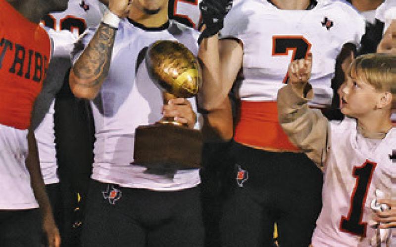 THE SOMERVILLE Yeguas celebrate a district championship football season. Tribune photo by Roy Sanders