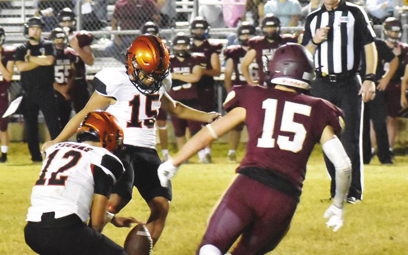 SOMERVILLE’S ULY PEREZ-MENDEZ kicks an extra point against Milano. The Yeguas won 34-22 and finished as district champions. Tribune photo by Roy Sanders