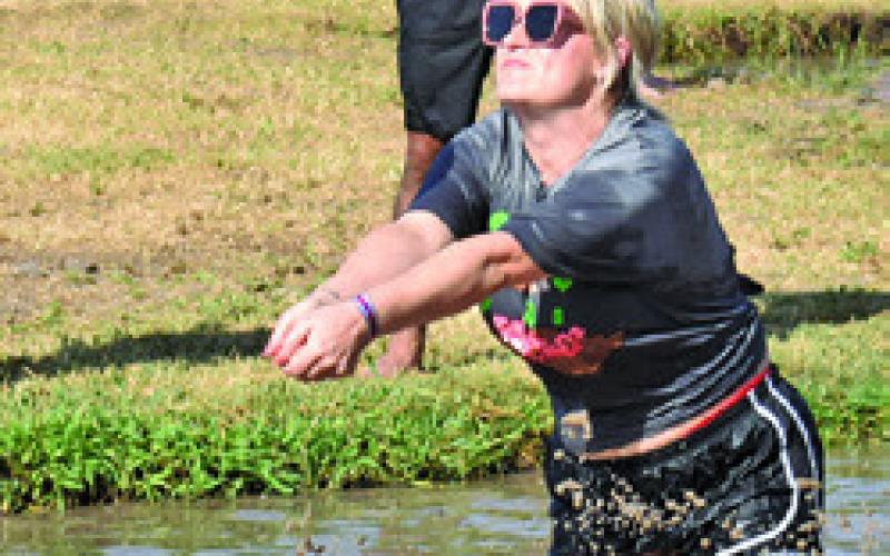 MUD VOLLEYBALL is enjoyed at Hog Splash 2026 on Saturday, Aug. 22, at Slovacek’s.