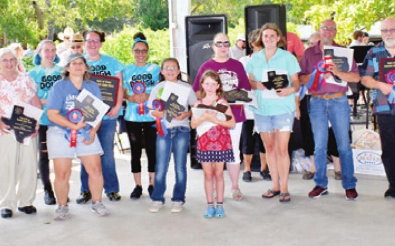 THE KOLACHE BAKE SHOW winners are pictured. From left is Madison Murphy, the Texas Czech-Slovak Queen, Madison Myers, Lydia Faust, Mary Myers, Jordan Folse, Mary Bass, Jo Jo Ralowicz, Faith Krause, Asa Sundstrom, Mary Polasek, Nicole Godwin, Eric Muehlstein, James Jordan, CSA Queen Emily Najdl and Miss Kolache Riley Green.