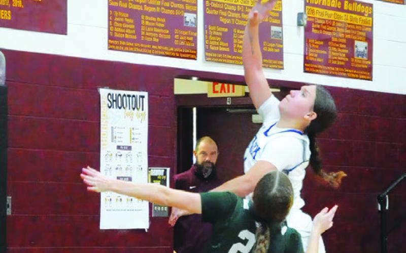 SNOOK’S JADEYN LARA SHOOTS a layup during the Snook-Valley Mills game at last week’s Thorndale Shootout basketball tournament. Tribune photo by Denise Squier