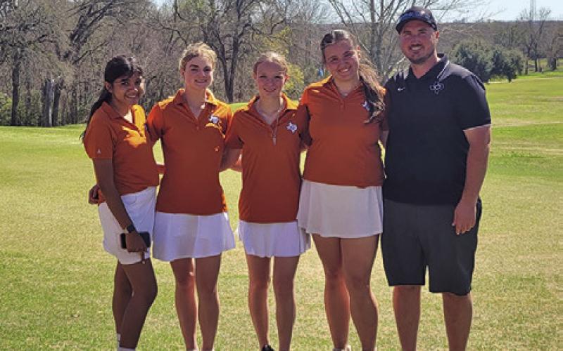 THE CALDWELL GIRLS golf team includes, from left, Patsy Pineda, Jordyn Hafernick, Alexa Johnson and Kierstyn Macik. Also pictured is Head Coach Jacob Schaefer. The girls placed fifth in Cameron.