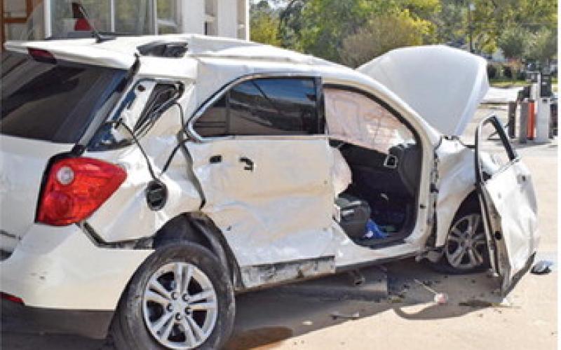 THIS CAR WAS DAMAGED on Friday, Nov. 14, in a collision with a truck on State Highway 21 near the Thomas Street intersection.