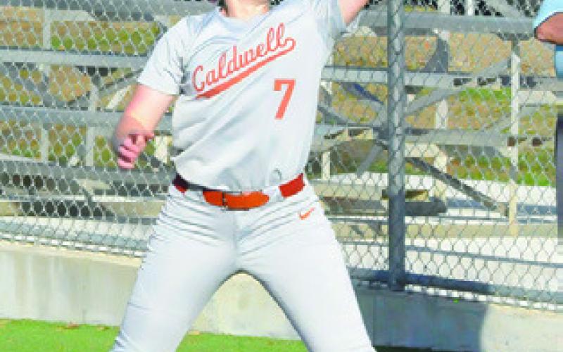 MIA WITHERWAX grabs the throw at first for a force out during the Caldwell-Lexington game last Thursday afternoon.