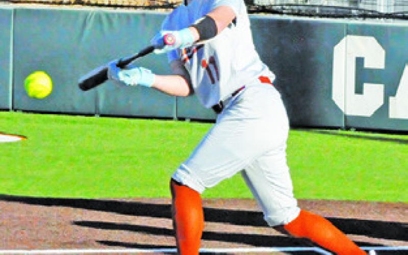 BREANN SIMS bunts during the Caldwell-Lexington game last Thursday afternoon.