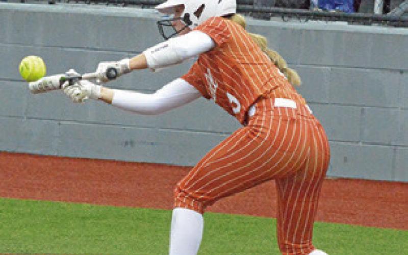 MOLLY MEADOWS bunts during the Caldwell-Robinson area playoff game last Thursday at Georgetown High School. Tribune photo by Denise Squier