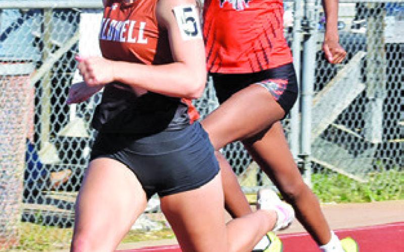 CALDWELL’S NATALIE Eastepp and Somerville’s Karys Ellis finish first and second in the girls 100-meter dash at last Thursday’s Happy Skrabanek Relays in Caldwell. Tribune photo by Roy Sanders
