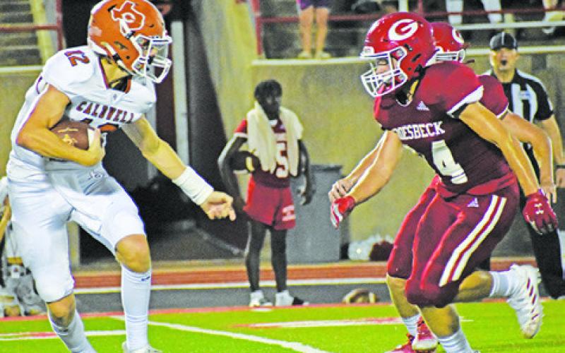CALDWELL QUARTERBACK BOONE Turner carries the ball against Groesbeck. The Hornets lost their opener 41-0 in Groesbeck