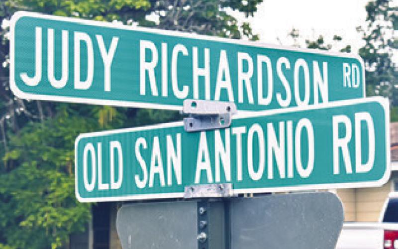 THIS STREET SIGN honoring Judy Richardson was recently placed at its intersection with OSR. Richardson was a noted business owner and civic leader in Caldwell.