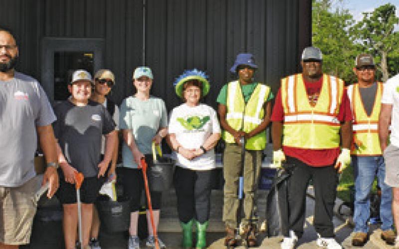 SOMERVILLE RESIDENTS PARTICIPATE on Saturday, April 26, in Spring Into Clean, Keep Somerville Beautiful. The city-wide cleanup effort drew a good crowd.