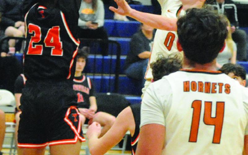 CAYDEN ZBORIL TAKES a shot against the Smithville Tigers. Tribune photo by Denise Squier
