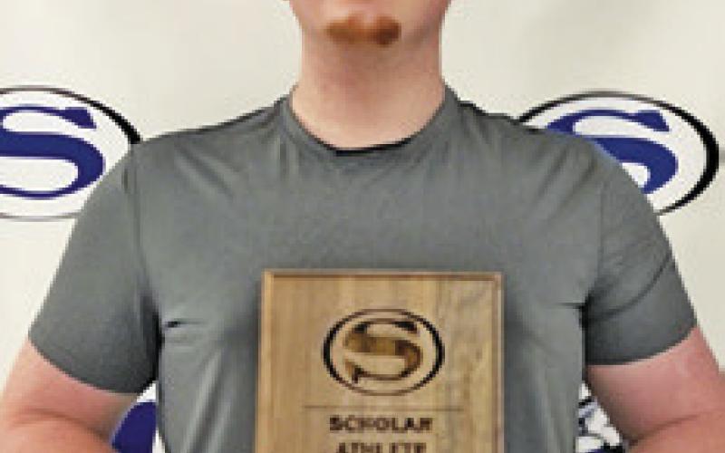 ALEX BOND was presented the boys (senior) Scholar Award for Snook Athletics.