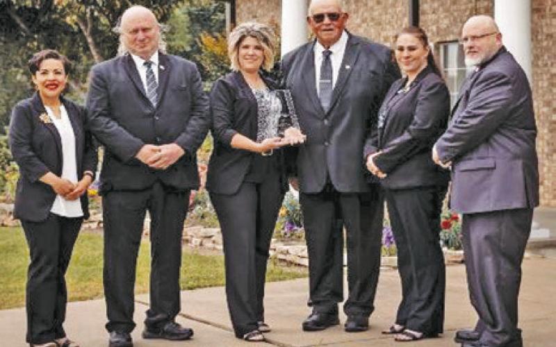 Pictured from left to right are Michelle Gallegos, David Trcalek, Marci Reat, Bill Sargent, Elizabeth Duvall, and Ken Wiltz.