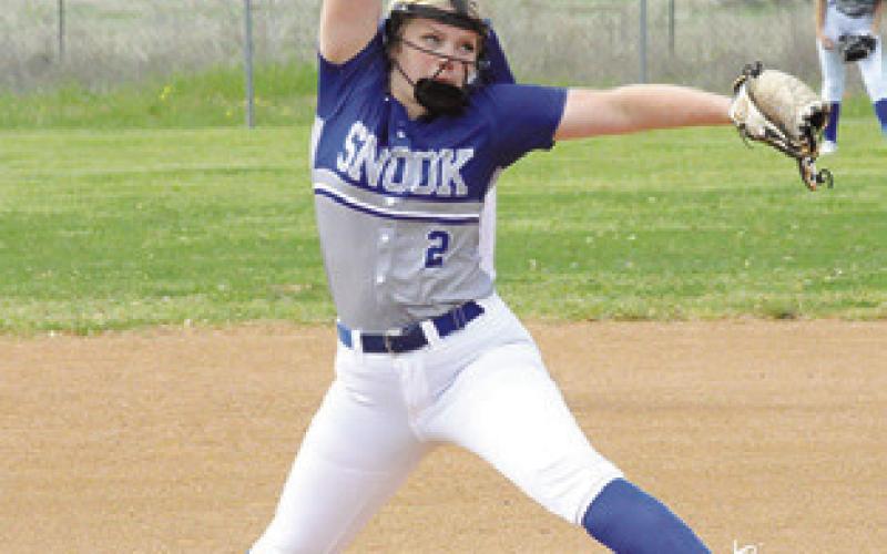 AUBREY BECKER winds up to pitch during the Snook-Mumford game last Monday.