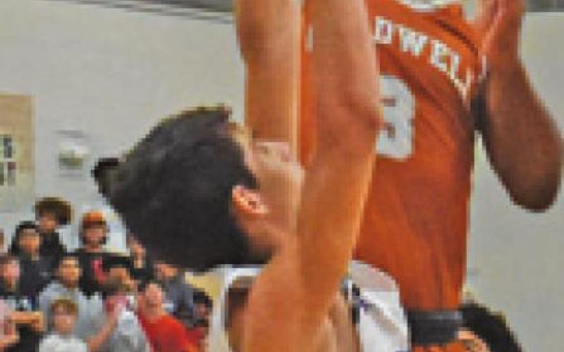 TRE BURNS OF Caldwell takes a shot last Thursday against Snook. Caldwell won 72-49.