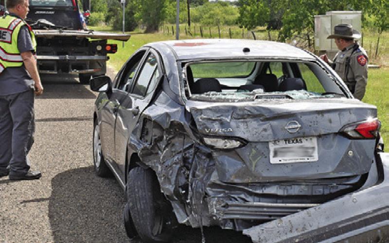 CALDWELL FIREFIGHTERS and DPS troopers respond along with Caldwell police to the scene of this multi-vehicle accident on Monday, June 30, on State Highway 21 East at County Road 300. No information was available at press time. Major accidents also occurred on Wednesday, June 25, on F.M. 60 East and on Sunday, June 29, on State Highway 36 South at F.M. 976.