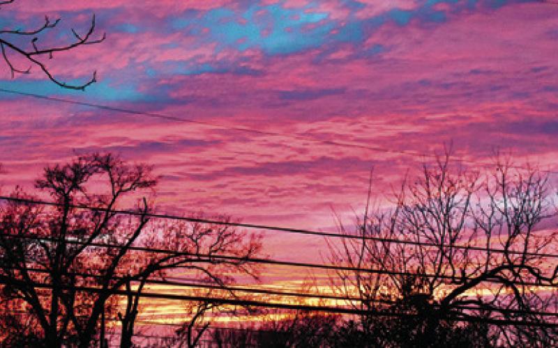 THIS SUNSET WAS visible at dusk on Wednesday, Jan. 29, from the west sky. Local residents and motorists enjoyed the view.