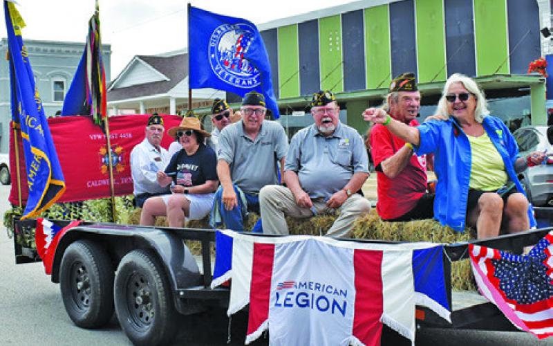 THE CALDWELL AMERICAN Legion Post No. 451 and the Caldwell VFW Post No. 4458 ride in this float during the Juneteeth Parade.
