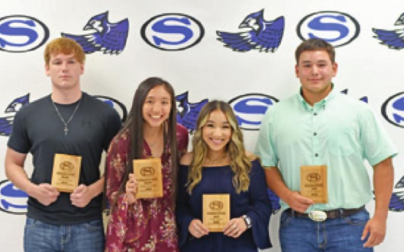 POWERLIFTING AWARD WINNERS were, from left, James Johnson, Boys Heart Award, Paola Arredondo, Girls Heart Award, Nadia Garcia, Girls MVP, and Cody Noriega, Boys MVP.