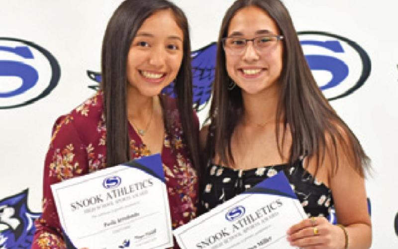 THE SNOOK ATHLETICS High School Sports Awards were presented to Paola Arredondo and Carmen Miller of the cross country team.