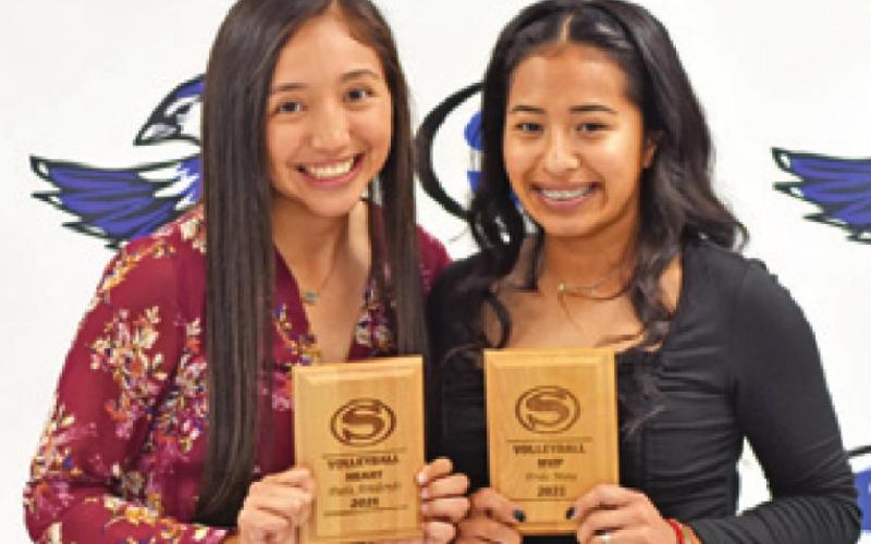 SNOOK VOLLEYBALL Award winners were Paola Arredondo, left, Heart Award, and Frieda Mota, right, MVP.
