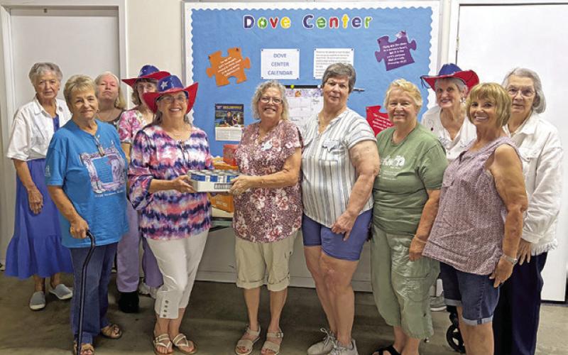 WILLIE HOBBS FROM ELIZABETH Lutheran Church food pantry was the speaker for the Lyons Education Extension Association meeting. Willie was presented with a food donation. Photo courtesy of Lyons EEA