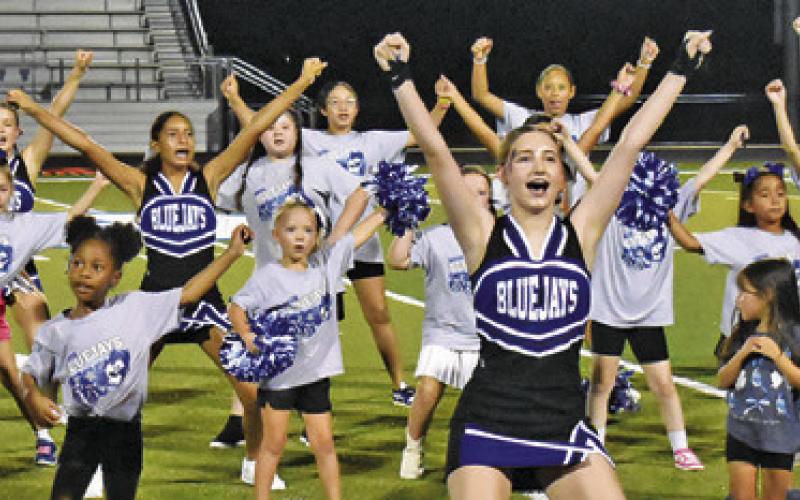 SNOOK CHEERLEADERS are joined by these youth at Meet the Bluejays on Friday night.