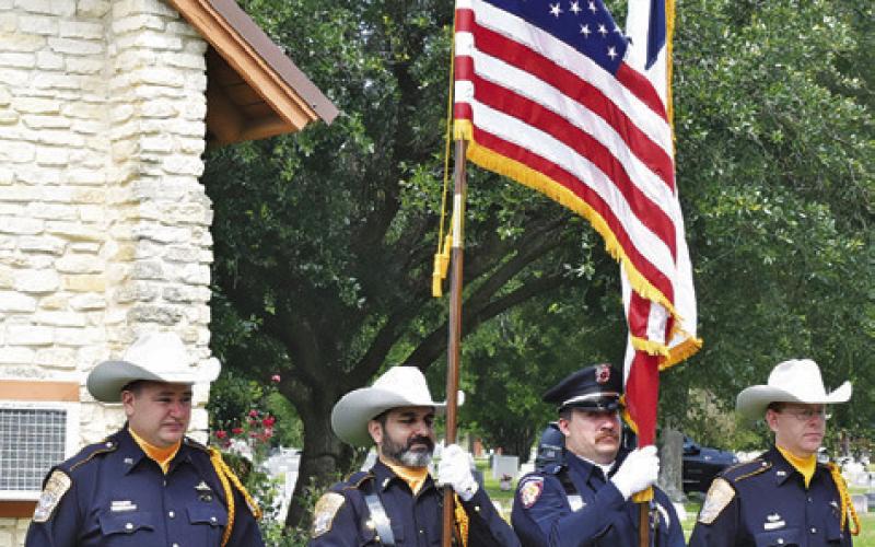 THIS RIFLE AND FLAG Honor Guard stood at attention at the graveside for Larry See’s burial. Funeral services were held at St. Mary’s Our Lady of the Lourdes Catholic Church with burial at the Caldwell Masonic Cemetery. -- Tribune photo by Roy Sanders