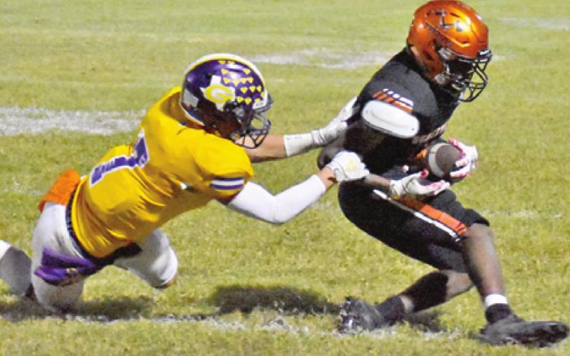 SOMERVILLE’S VERKOBE WOODBERRY makes a catch.