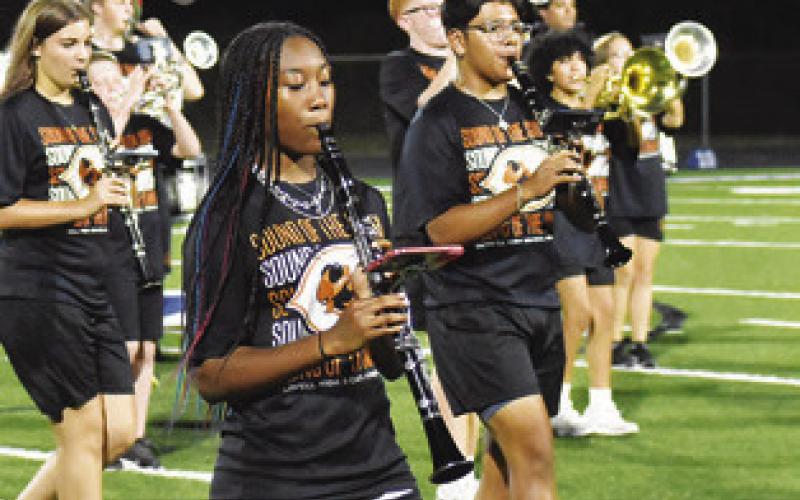 THE CALDWELL HORNETS Marching Band performs at the Caldwell-Crockett football game. Tribune photo by Roy Sanders