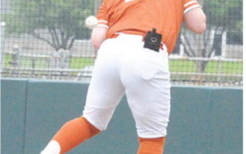 BATTER LUCAS PEEL of Caldwell gets hit by this pitch. -- Tribune photo by Denise Squier