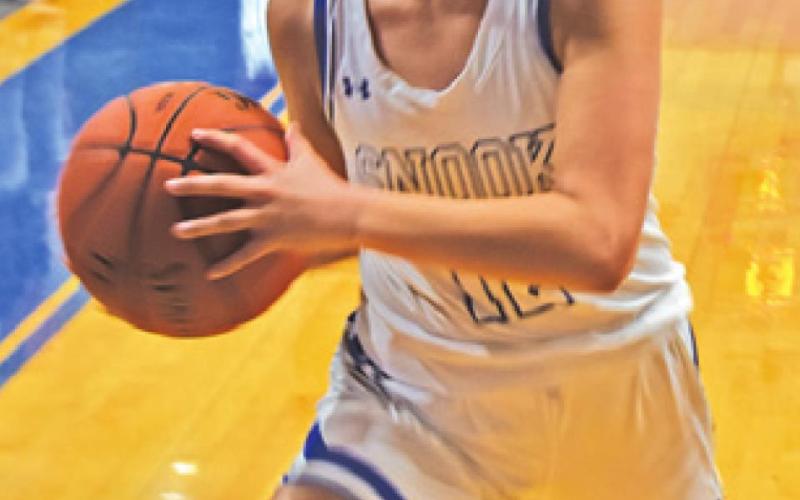 CARMEN MILLER was Snook’s top scorer last Tuesday against Madisonville, scoring four points. -- Tribune photo by Denise Squier