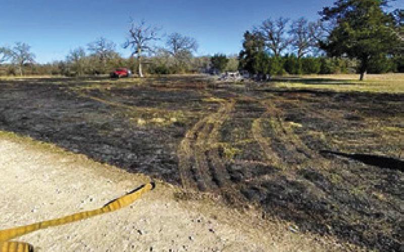 SOME ACREAGE is burned at one of many fire calls over the weekend. Photo by Snook Volunteer Fire Department