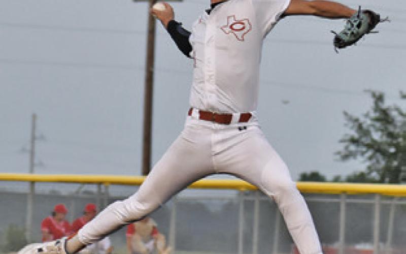 CALDWELL’S SHANE Clements hurls this pitch against Bellville. Tribune photo by Roy Sanders