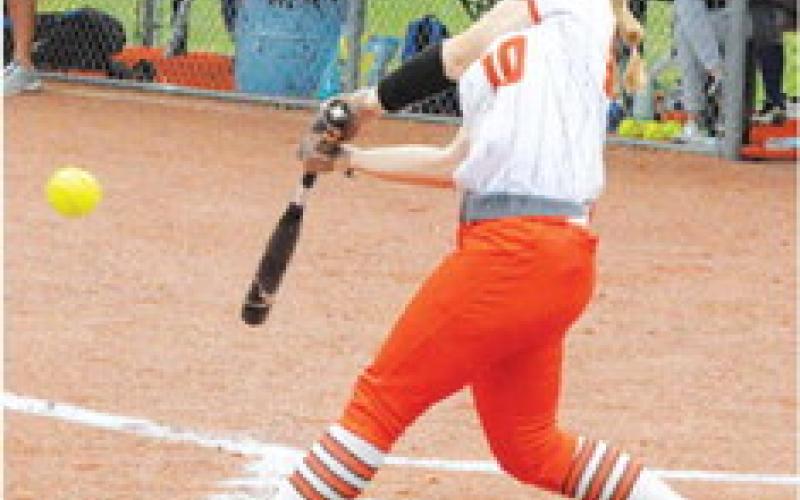ABIGAIL FLENCHER gets a hit for the Lady Yeguas during the Snook-Somerville game last Friday night. -- Tribune photo by Denise Squier
