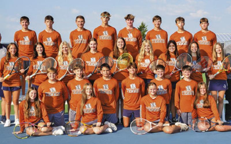 The CHS team tennis team beat Taylor High School on Monday afternoon 17-2 to go undefeated in regular season play and earn the District 24-4A title.