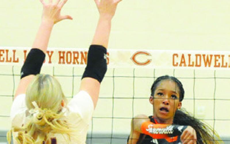 KARYS ELLIS gets a kill during the Somerville- Thorndale bi-district match on Thursday. Tribune photo by Denise Squier
