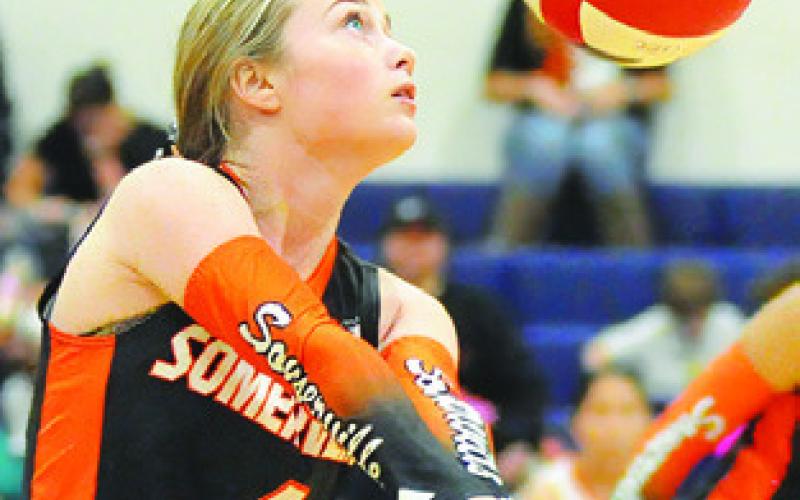 RHYAN RICCI bumps the ball during the Somerville-Thorndale bi-district match last Thursday night in Caldwell. Tribune photo by Denise Squier