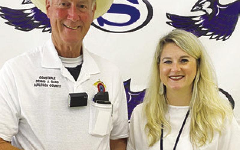 COPS4KIDS RECENTLY donated $2,050 to Snook ISD. The check was presented to new Superintendent Kimberly Giesenschlag by Constable Dennis J. Gaas.